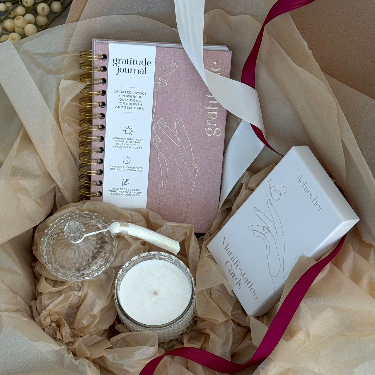 Beautifully curated analog bag of Achievher products and bonus creative tools